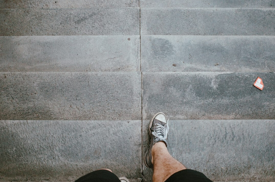 person taking first step on path