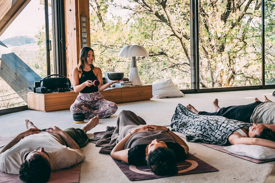 person meditating in nature